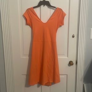 Pact coral colored cut out back dress with pockets